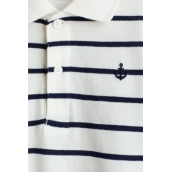 Polo en piqué de coton avec motif brodé devant - Enfant