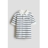 Polo en piqué de coton avec motif brodé devant - Enfant